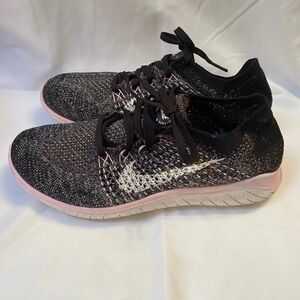 Nike Free RN Flyknit Sneakers Sz 8.5 women’s preowned.  Pink & Black